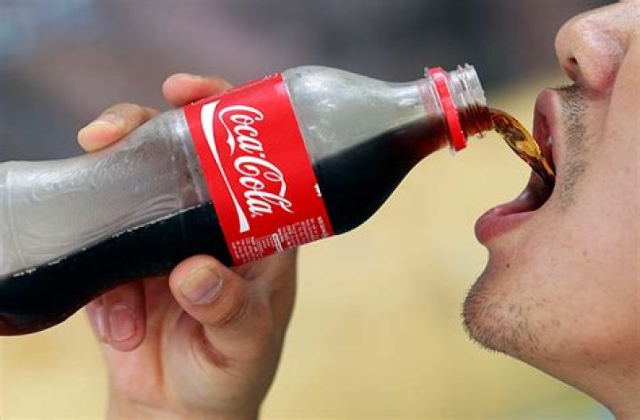 Can I drink Coke after gum surgery?