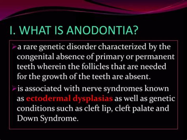 What causes partial anodontia?