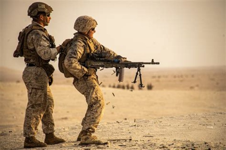What MOS is a door gunner in the USMC?
